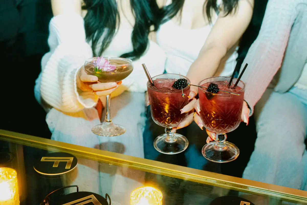 A bright hotel bar beneath a chandelier, suited to a first meeting